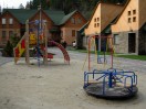 Children Playground, on the backgroung of Chalets, Hotel «Lavender Country Club»